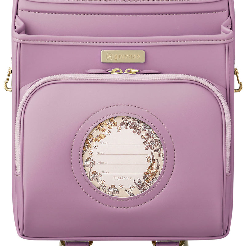 草花がのぞく、おしゃれな円形の窓