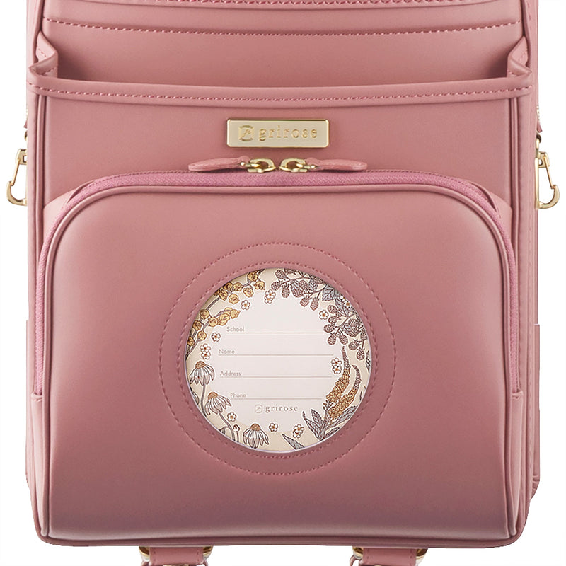 草花がのぞく、おしゃれな円形の窓