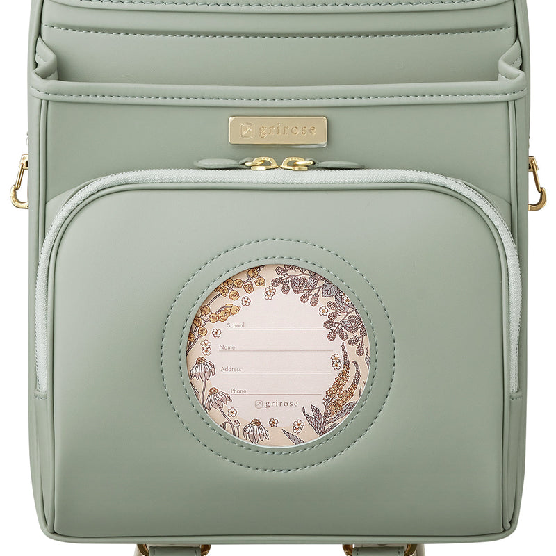 草花がのぞく、おしゃれな円形の窓