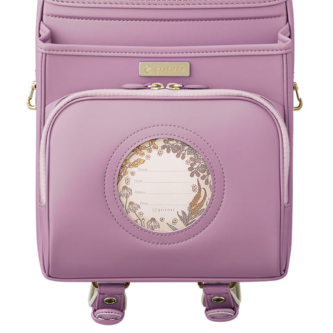 草花がのぞく、おしゃれな円形の窓